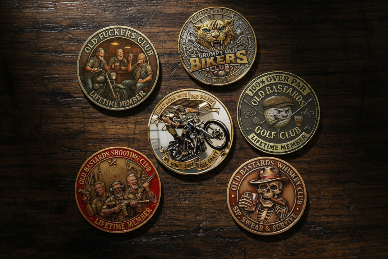 Six Old Bastards Club lifetime member novelty coins displayed on dark weathered oak wood — Old Fuckers Club, Grumpy Old Bikers Club, Golf Club, Shooting Club and Whiskey Club collectible coins