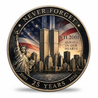 9/11 25th anniversary coin showing the Twin Towers above the New York skyline beside the Statue of Liberty, with an American flag across the sky. Inscriptions read “NEVER FORGET”, “9.11.2001” and “ALWAYS IN OUR HEARTS”, with 2001, 25 YEARS and 2026 along the lower border, available at One More Coin store