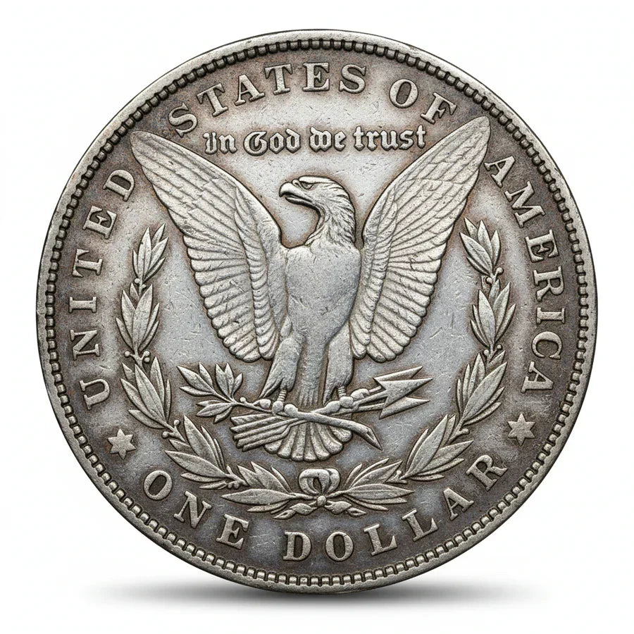 Silver dollar coin with an eagle and 'In God We Trust' inscription on a white background