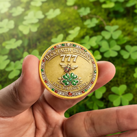 Hand holding 777 Luck Faith Destiny collectible coin with honeybee and four-leaf clover lucky charm collectible token available at One More Coin store
