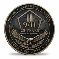 Dark 9/11 memorial coin reverse featuring a shield with twin vertical bars above “9/11”, “25 YEARS” and “STRONGER TOGETHER”, with a spread-winged eagle and leafy branches below. The rim reads “HONOR · REMEMBER · UNITE” and “COURAGE · RESILIENCE · HOPE,” collectible token
