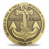 A round metallic anchor challenge coin with engraved text reading 'THE LORD IS MY ROCK, MY SHIELD, MY SALVATION, MY STRONGHOLO' and 'PSALMS 18:2'. The center shows an anchor with rope and a small circular emblem at the top, photographed on a light gray background with a soft shadow underneath. Available at one more coin store