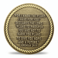 A round bronze-toned coin with a rope border and raised text from Jeremiah 29:11, shown on a clean white background with a soft shadow underneath.