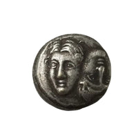 Ancient Greek Istria coin showing two-faced Janus-style head with one face up and one face down - antique silver finish 40g
