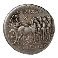 Ancient Greek coin reverse showing winged Victory Nike driving four-horse chariot biga with ΛΑΖΙΛΙΣΣΑ inscription - antique silver finish 15g