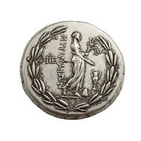 Ancient Greek coin reverse showing Victory Nike holding wreath and palm branch within laurel wreath border - antique silver finish 57g