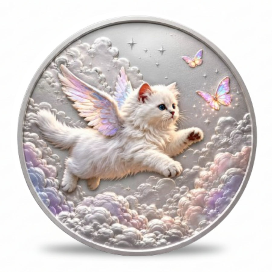 A round silver-toned coin or medallion featuring a fluffy white kitten with pastel rainbow wings flying among soft clouds, with two iridescent butterflies and small stars in the sky.