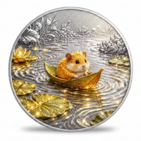 A round silver-toned coin featuring a small orange-brown mouse sitting in a golden leaf on water, surrounded by gold lily pads and lotus flowers, with a silver-toned background and reeds.
