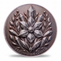 A round 1 oz copper coin featuring a detailed relief design of a flower and leafy wreath with crystal-like facets