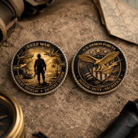 Two military challenge coins displayed on a textured stone surface. The left coin is labeled 'GULF WAR' with a desert storm scene and the years 1990 and 1991.