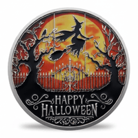 A round commemorative coin celebrating Halloween, featuring a witch riding a broomstick over a haunted fence and tree silhouette against a large orange full moon. The bottom of the coin reads 'HAPPY HALLOWEEN' in silver lettering, all set on a black background with a polished silver rim.