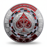 PokerStrategy.com poker coin reverse featuring ornate silver spade with decorative scrollwork and roulette wheel pattern
