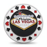 Welcome to Fabulous Las Vegas poker coin front featuring iconic Las Vegas sign with playing card suits border on silver finish