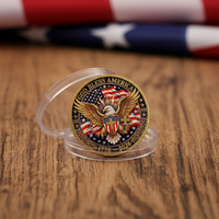 America 250 God Bless America collectible coin in clear capsule case on dark oak wood surface patriotic display
