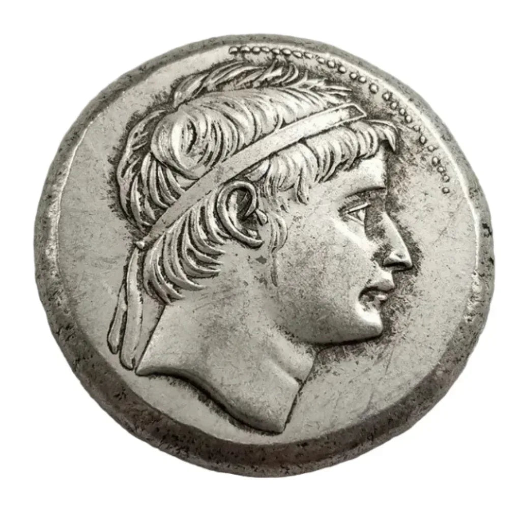 Ancient Greek standing deity commemorative collectible coin youthful portrait wavy hair headband Hellenistic antique silver historical coin gift for collectors available at One More Coin store
