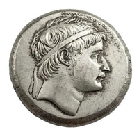 Ancient Greek standing deity commemorative collectible coin youthful portrait wavy hair headband Hellenistic antique silver historical coin gift for collectors available at One More Coin store
