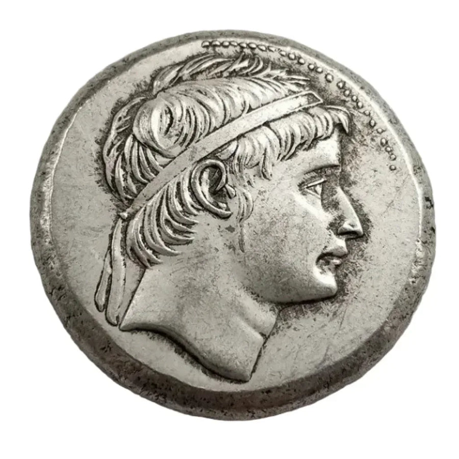 Ancient Greek standing deity commemorative collectible coin youthful portrait wavy hair headband Hellenistic antique silver historical coin gift for collectors available at One More Coin store
