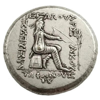 Ancient Parthian coin reverse side seated archer bow Greek inscription Persian empire antique silver collectible coin

