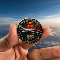 B-52 Stratofortress coin hand held sky background