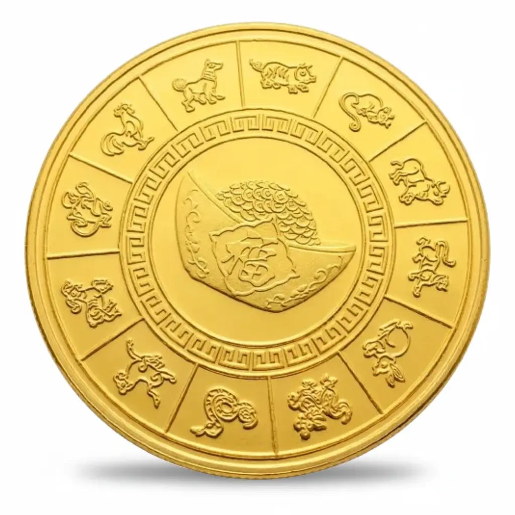 Gold-tone betta fish coin reverse with twelve Chinese zodiac animals in separate panels around the rim, enclosing a geometric patterned ring and a central ingot motif topped with a pile of coins, collectible token