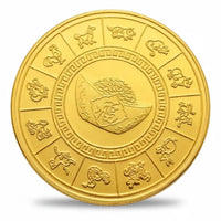 Gold-tone betta fish coin reverse with twelve Chinese zodiac animals in separate panels around the rim, enclosing a geometric patterned ring and a central ingot motif topped with a pile of coins, collectible token