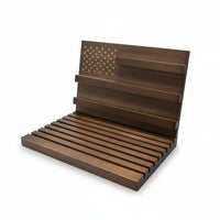 Empty challenge coin display stand showing grooves and slots