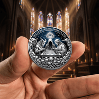 A silver-toned commemorative coin featuring a fantasy chess scene with an all-seeing eye, skulls, and the text 'THE GAME OF FATE, GOOD VS EVIL', held in a person's hand against a blurred gothic cathedral interior background.
