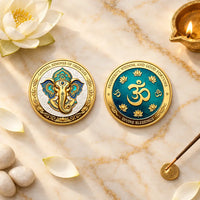 Ganesha Om Divine Blessings coin both sides overhead flat lay white marble lotus flower incense brass diya spiritual devotional Hindu collectible
