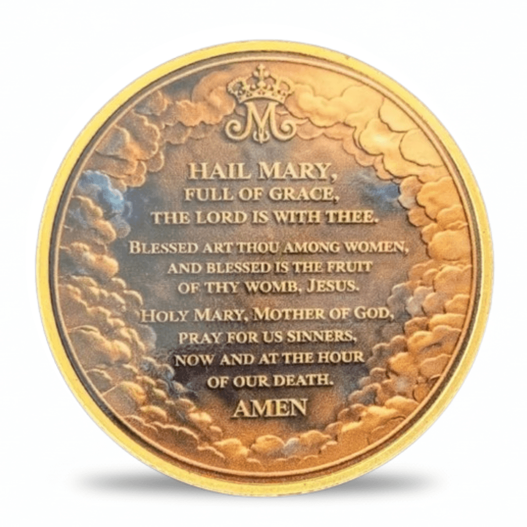 A round gold-toned religious coin with embossed clouds and a printed prayer addressed to Mary, shown on a plain white background.