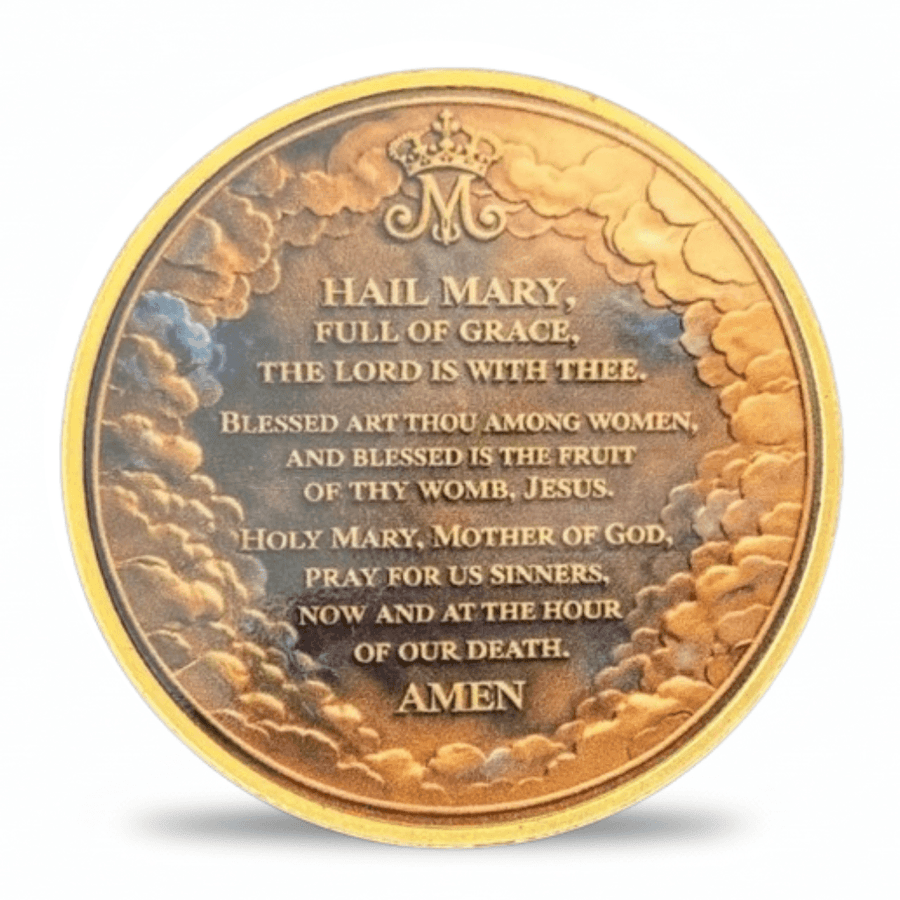 A round gold-toned religious coin with embossed clouds and a printed prayer addressed to Mary, shown on a plain white background.
