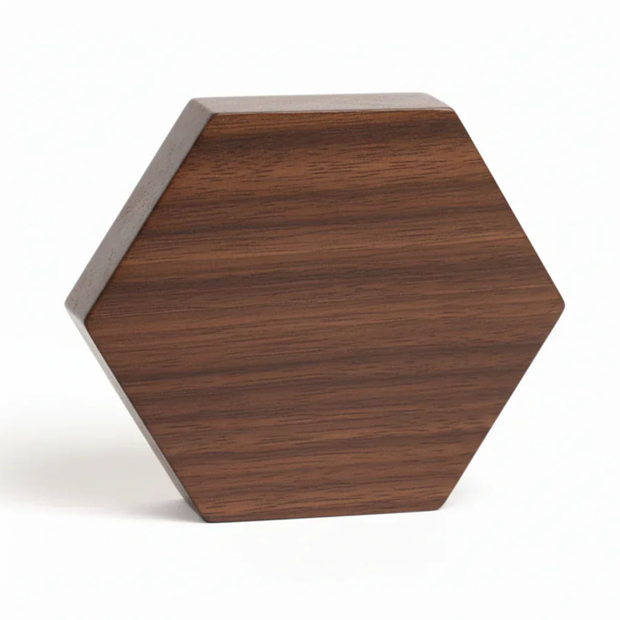 Ebony wood hexagonal coin display case base showing solid construction
