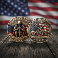 Two military veteran challenge coins displayed side by side on a rustic wooden surface with a blurred American flag background. The left coin reads 'I AM A VETERAN' and features a kneeling soldier with an rifle, with an American flag motif.