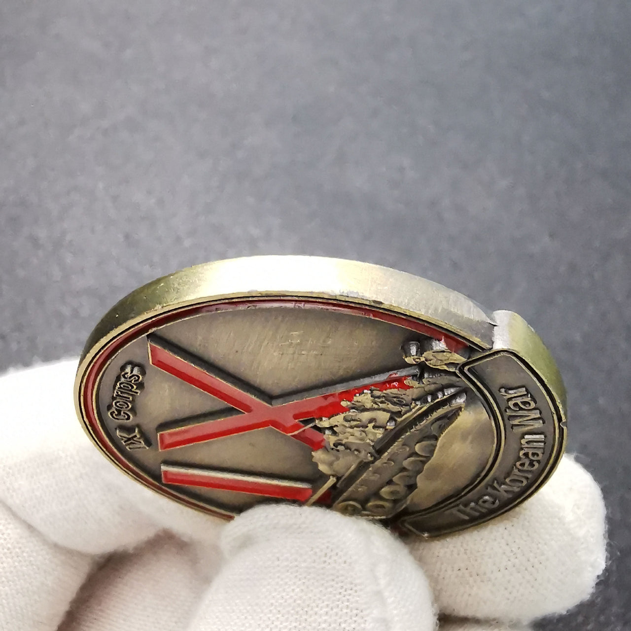 Korean War challenge coin side profile showing 3mm thickness and antique gold edge finish military collectible token
