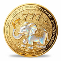 Lucky 777 Wealth Elephant collectible coin front face white iridescent elephant trunk raised ornate gold saddle 777 numerals pearl enamel prosperity collectible available at One More Coin store
