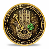 Gold-tone Hamsa hand coin with eye, key and green clover, available at One More Coin store