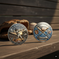 Two round baseball-themed commemorative coins displayed on a wooden surface, with a brown leather baseball glove and a baseball in the background. One coin shows a silver-toned baseball player at bat, and the other shows a blue-toned baseball scene with crossed bats and baseball gear.