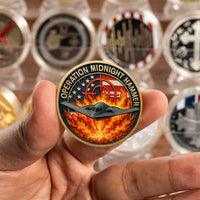 Operation Midnight Hammer B-2 Spirit challenge coin held in hand showing size and detail military collectible
