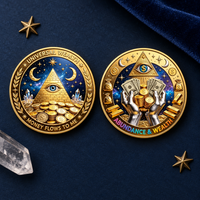 Universal Wealth and Abundance & Wealth coin faces on a midnight-blue tabletop with subtle celestial props, collectible token