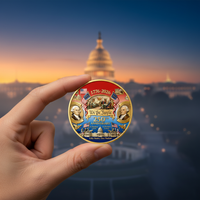 We the People coin obverse held against DC Capitol sunrise