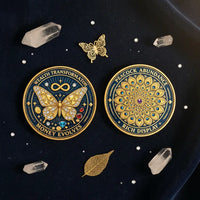 Wealth Transformation Butterfly Peacock coin both sides overhead flat lay deep navy velvet crystal quartz points gold butterfly charm rhinestones abundance prosperity lucky charm collectible