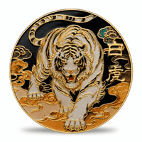 A round gold and white enamel coin featuring a detailed tiger design, with black enamel accents, cloud motifs, and Chinese characters on a white background. Available at one more coin store