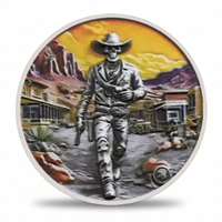 Decorative plate with a cowboy design against a mountainous desert backdrop
